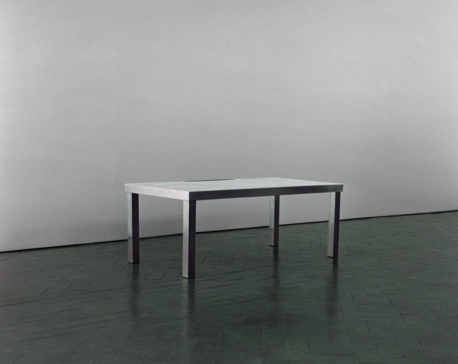 scanned photograph of inohx workstation against wall